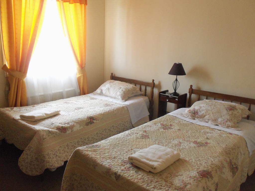 Hostal Joshiken Punta Arenas Rom bilde